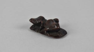 A Carved Wooden Netsuke Depicting Two Frogs on Lilypad, Signed to Base, 4.5cms Wide