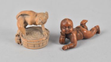 Two Modern Carved Wooden Netsukes, One in the Form of Reclining Baby, The Other Erotic Example