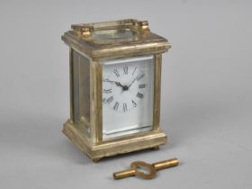 A Reproduction Miniature French Style Silver Plated Carriage Clock with White Enamelled Dial,