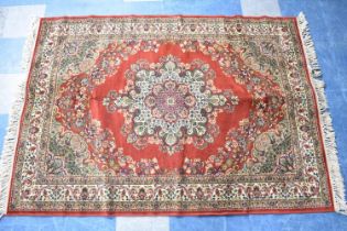 A Modern Patterned Rug on Red Ground, 193x140cm