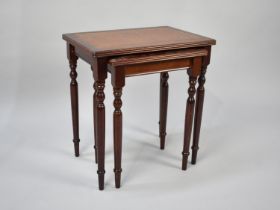 A Nest of Two Tooled Leather Topped Table, Late 20th Century, 34cms Wide