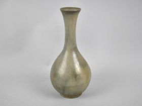 A Reproduction Chinese Celadon Glazed Bottle Vase, 21.5cm high