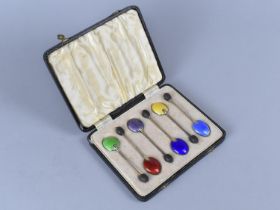 A Cased Set of Six Silver and Enamel Coffee Spoons all Having Coloured Bowl Engine Turned Enamel