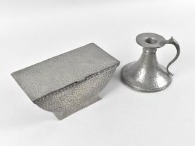 An Arts and Crafts Pewter Bed Chamber Stick by Abbey and a Similar Sarcophagus Shaped Box with