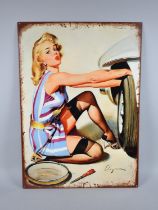 A Vintage Reproduction Printed Tin Sign, Girl in Stockings Changing Car Tyre, 50x75cms