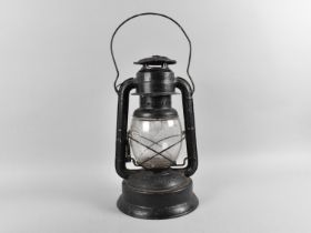 A Vintage Black Painted Hurricane Lamp