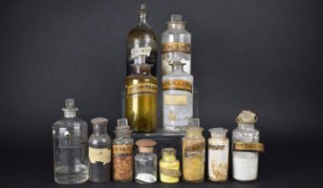 A Collection of Twelve Various 19th and Early 20th Century Glass Chemist's or Apothecary Bottles