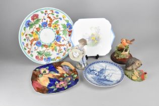 A Collection of Various Decorated Plates and Ceramic Ornaments