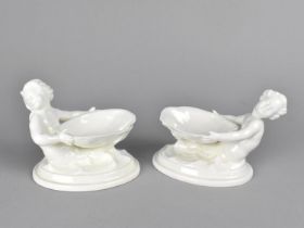 Two Royal Worcester Salts in the Form of Merboys Supporting Shell, No. 349