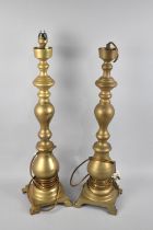 A Pair of Tall Brass Table Lamp Bases, One Requiring new Light Fittings and No Shades, 60cms High