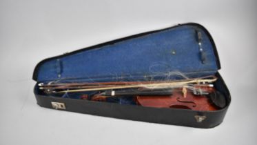 A Vintage Student Violin with Three Bows, Case and Accessories