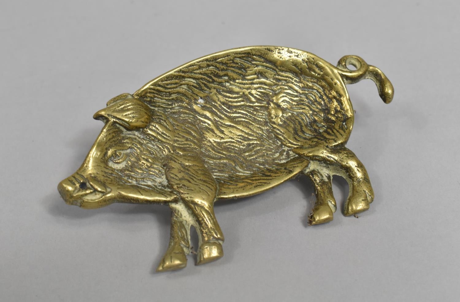 A Small Novelty Brass Shallow Dish in the Form of a Pig, 11.5cms Wide
