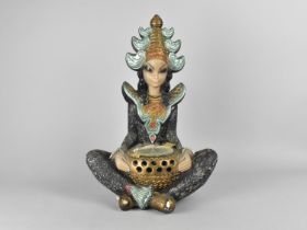 A 1950s Cold Painted Plaster Novelty Table Lamp in the Form of a Cross Legged Seated Thai Goddess,