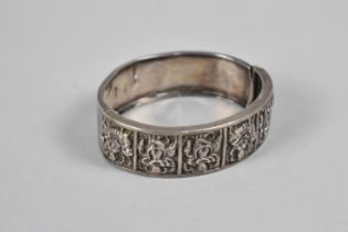 A Victorian Silver Hinged Bangle, Six Panels to Front depicting Indian Deity Scenes, Birmingham