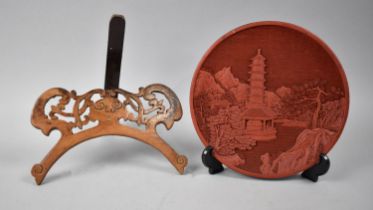 A Cinnabar Lacquer Plate Decorated with Tall Pagoda together with a Pierced Wooden Plate Stand (