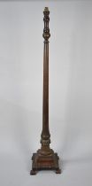 An Edwardian Turned Mahogany Standard Lamp on Stepped Square Supports with Ogee Bracket Feet,