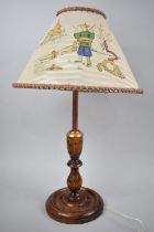 An Early to Mid 20th Century Turned Oak Table Lamp with Brass Mounts and Copper Supports,