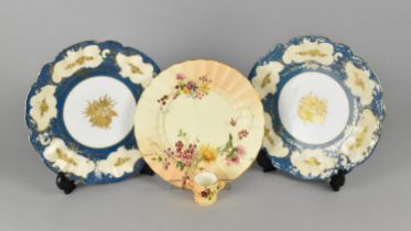 Two Limoges Porcelain Plates Decorated with Gilt Floral Bursts and Blue Inset with Retailers Mark