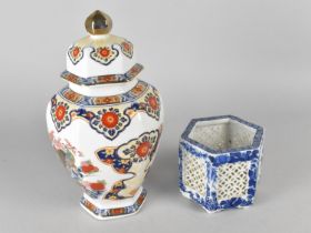 An Oriental Hexagonal Vase and Cover Together with a Pierced Hexagonal Vase