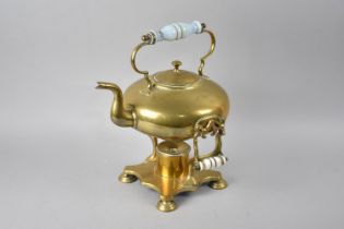 A Late Victorian/Edwardian Brass Spirit Kettle on Stand with Glass Carrying Handles, AF, 33cms High