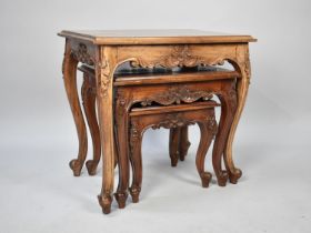 A Modern Carved Mahogany Nest of Three Tables on Cabriole Supports, 60cms Wide