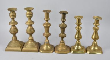 Three Pairs of Victorian Brass Candlesticks, All with Pushers, Tallest 26cms