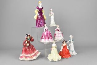 A Collection of Various Ceramic Figures to Include Royal Doulton 'Christmas Time', 'Loretta',