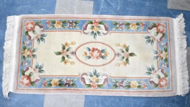 A Chinese Woollen Patterned Hearth Rug, 130x62cm