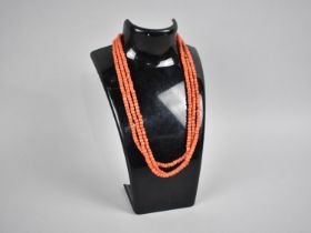 A Red Coral Bead Necklace, 130cms Long, 41.5gms, Matched Conical Beads Measuring 4.4mm by 3.4mm