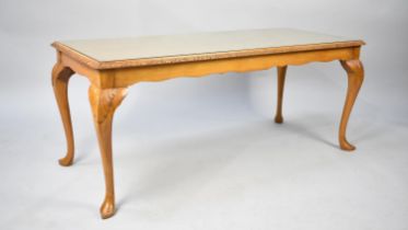 A Modern Burr Walnut Rectangular Coffee Table on Cabriole Supports, 107cms by 45cms