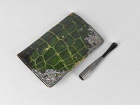 An Early 20th Century Silver Mounted Crocodile Skin Wallet Containing Unfranked British Stamps