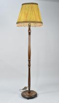 A Mid 20th Century Turned Wooden Standard Lamp with Shade