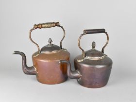 Two Large Late 19th/Early 20th Century Copper Kettles, taller with Ribbed Handle, 31cms High