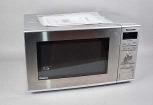 A Panasonic Microwave Oven, nnsd27hs purchased 2022, with manual