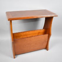 A Modern Crossbanded Yew Wood Magazine Rack table, 49.5cms Long