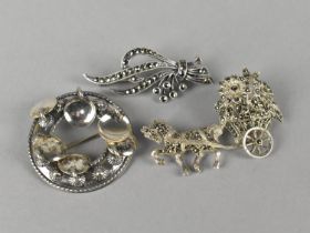 A Finnish Kinetic Style Circular Brooch an Two Silver and Marcasite Brooches, Horse and Cart of