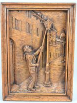 A Carved French Wooden Panel Depicting Lamp Lighter, 38x28cms