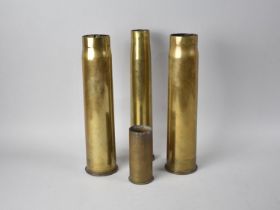 A Collection of Four Brass Shell Cases, Tallest 31cms High