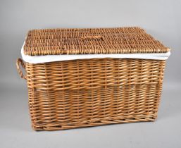 A Wicker Basket with Cloth Liner, 61cms Wide