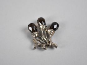 An Unusual Pendant, White Metal and Smoked Glass Beads in the Form of Berries and Branch,