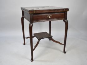 An Edwardian Mahogany Envelope Games Table Complete with Coin Well Covers and Single Long Drawer,