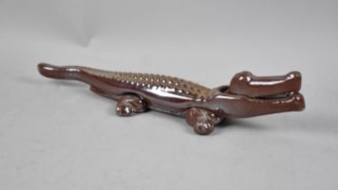 An Enamelled Novelty Nutcracker in the Form of a Crocodile, 34cms Long