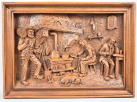 A French Carved Wall Hanging Panel Depicting internal Kitchen Scene, Signed CA Moran, 52cms by 38cms