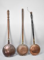 A Collection of Three 19th Century Copper Bed Warming Pans, All with Turned Wooden Handles