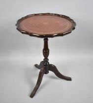 A Modern Circular Topped Tripod Wine Table with Tooled Leather Insert, 35cms Diameter