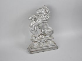 A Late 19th Century Cast Iron Doorstop in the Form of Lion Rampant, 35cms High