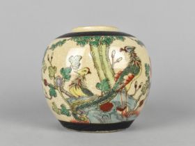 A Chinese Nanking Crackle Glazed Ginger Jar Decorated in Polychrome Enamels with Birds and Branches,