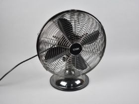 A Modern Logik Table Top Fan