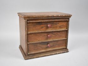 An Edwardian Table Top Oak Three Drawer Collectors Cabinet or Apprentice Piece, 25cms by 15cms by