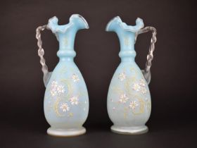 A Pair of Victorian Opaque Glass Ewers with Hand Painted Floral Decoration, One AF, 24cm high